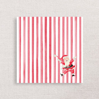 This is a red decorative paper napkins by Papel Custom Design called jolly santa premium holiday cocktail napkins in standard