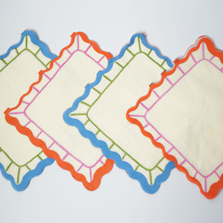 This is a multicolor decorative paper napkins by POP Party Supplies called art party scalloped napkins in standard