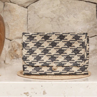 This is a black wedding apparel by Suzanne Seick called patterned black plaid motif rattan clutches in standard