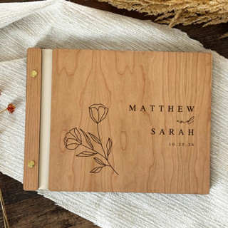 This is a natural guest books by Katrina Mejia called sleek botanical wedding guest book | cherry wood | 8.5 x 11 in standard