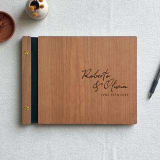 This is a brown guest books by Katrina Mejia called signature style wedding guest book | cherry wood | 8.5 x 11 in standard