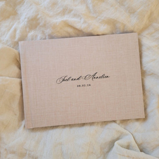 This is a multicolorassorted-colors guest books by Studio Lavender called photo guest book album in standard