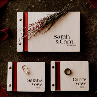 This is a red guest books by Katrina Mejia called gothic wedding guest book & vow book set | maple wood | set of 3 books in standard