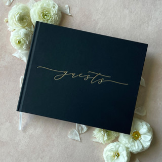 This is a black guest books by Barbara Gregory called black minimalist guest book in standard