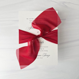 This is a red wedding ribbon by Honey Silks Co called 2" signature sheer - red in standard