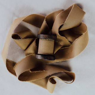 This is a brown wedding ribbon by Jordan Perry called ribbon linen 1.5" wide mocha in standard