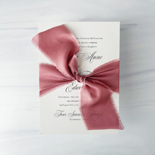 This is a purple wedding ribbon by Honey Silks Co called heirloom collection silk ribbon - mauve 2" x 5 yards in standard