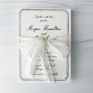 This is a white wedding ribbon by Honey Silks Co called fair trade recycled silk ribbon - off white in standard