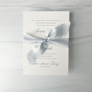 This is a blue wedding ribbon by Honey Silks Co called heirloom collection silk ribbon - pale dusty blue 1" in standard