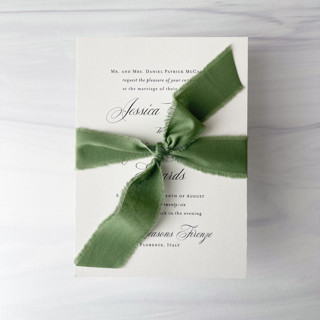 This is a green wedding ribbon by Honey Silks Co called 1" x 5 yards cotton ribbon - fern in standard