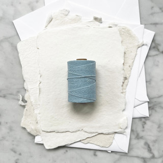 This is a blue wedding ribbon by Jenny Sanders called baby blue waxed linen twine, 4-ply in standard