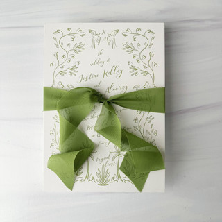 This is a green wedding ribbon by Honey Silks Co called 1" x 5 yards signature sheer ribbon- deep chartreuse in standard