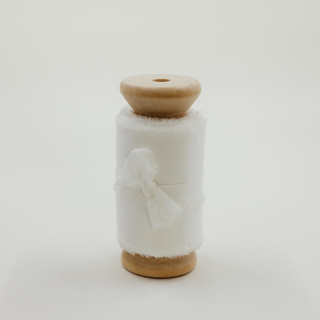 This is a white wedding ribbon by Jordan Perry called silk wedding ribbon white 2" wide in standard