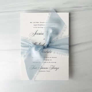 This is a blue wedding ribbon by Honey Silks Co called 2" signature sheer - baby blue in standard