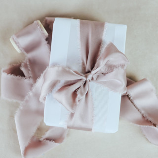 This is a pink wedding ribbon by Jordan Perry called wedding ribbon sateen 1.5" wide rose in standard
