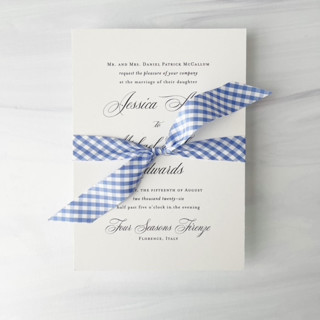 This is a blue wedding ribbon by Honey Silks Co called 3/4" cotton ribbon - blue gingham in standard