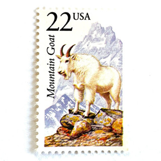 This is a white stamps by Heritage Post House called mountain goat postage stamps | north american wildlife series | wedding stamps | vintage unused usps postage 22c | pack of 10 in standard