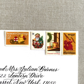 This is a gold stamps by Heritage Post House called christmas gold vintage postage set | christmas stamps | each set will mail a 1 oz letter | 10 sets (40 stamps total) in standard