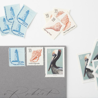 This is a blue stamps by Flourish Fine Writing called coastal affair postage set // set of 5 // $.88 in postage per set in standard