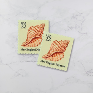 This is a beige stamps by The Silver Stamps called new england neptune | vintage stamp, 22 cents, 1985 | 5 each in standard