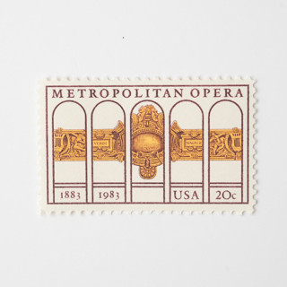 This is a gold stamps by Flourish Fine Writing called 20 cent metropolitan opera postage stamps // set of 10 // unused vintage stamps in standard