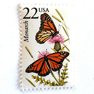 This is a orange stamps by Heritage Post House called monarch butterfly postage stamps | north american wildlife series | wedding stamps | vintage unused usps postage 22c | pack of 10 in standard