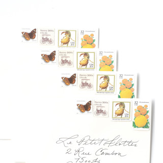 This is a yellow stamps by Flourish Fine Writing called yellow and orange garden vintage postage stamp set // set of 5  // 94 cents each in standard