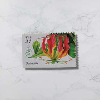 This is a multicolor stamps by The Silver Stamps called gloriosa lily | vintage stamp, 33 cents, 1999 | 5 each in standard
