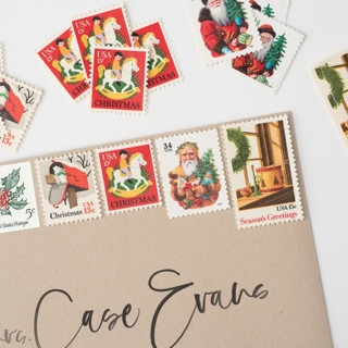 This is a red stamps by Flourish Fine Writing called christmas mail and vintage santa postage set // set of 5 // unused // hobby horse // snow in standard