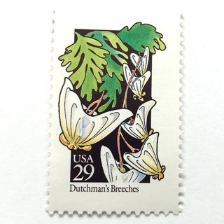 This is a white stamps by Heritage Post House called dutchman's breeches postage stamps | american wildflower series | white flower | botanical | vintage unused usps postage 29c | pack of 10 in standard