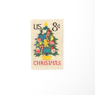 This is a green stamps by Flourish Fine Writing called 8 cent christmas tree needlepoint postage stamps // set of 10 // unused vintage holiday stamps in standard