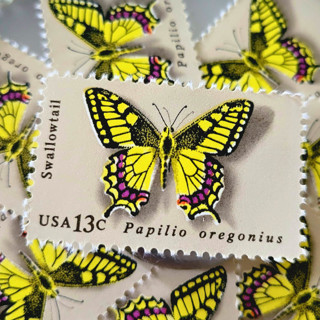 This is a gold stamps by The Silver Stamps called butterfly: swallowtail | vintage stamp, 13 cents, 1977 | 5 each in standard