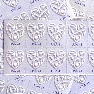This is a purple stamps by Heritage Post House called purple wedding hearts postage stamp | wedding series | vintage unused usps postage 41c | pack of 10 in standard