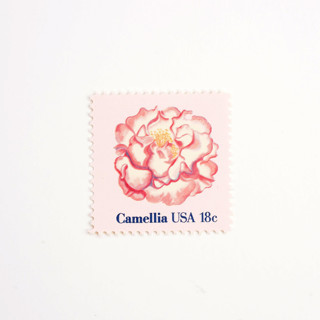 This is a pink stamps by Flourish Fine Writing called 18 cent camellia postage stamps // set of 10 // unused in standard