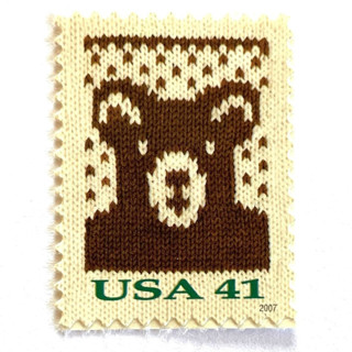 This is a brown stamps by Jennifer Kramer called holiday knits “bear” postage stamps | contemporary christmas series | vintage unused usps postage 41c | pack of 10 in standard