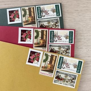 This is a red stamps by Kristen Melchor called $1.09 cents . red camellia holiday postage stamps . set of 5 in standard