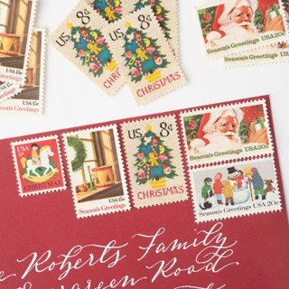 This is a red stamps by Flourish Fine Writing called snow days holiday postage set // set of 5 // unused // santa // needlepoint in standard