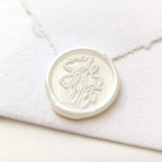 This is a multicolor wax seals by Inkspiringletters called anemones- customizable color- set of 25 hand-crafted wax seals in standard