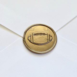 This is a multicolor wax seals by Inkspiringletters called football- customizable color- hand-crafted wax seals- set of 25 in standard