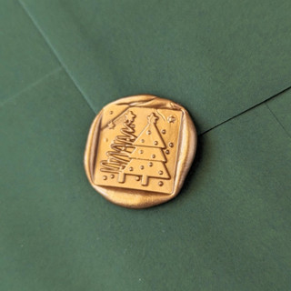 This is a multicolor wax seals by Inkspiringletters called christmas tree- customizable color- set of 25  hand-crafted wax seals in standard
