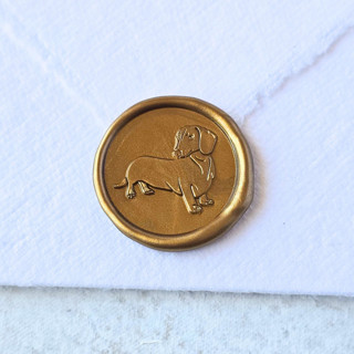 This is a multicolor wax seals by Inkspiringletters called doxie- customizable color- set of 25 hand-crafted wax seals in standard