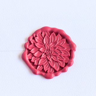 This is a multicolor wax seals by Inkspiringletters called dinnerplate dahlia- customizable color- set of 25hand-crafted wax seals in standard