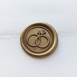 This is a multicolor wax seals by Inkspiringletters called wedding bands- customizable color- set of 25 hand-crafted wax seals in standard