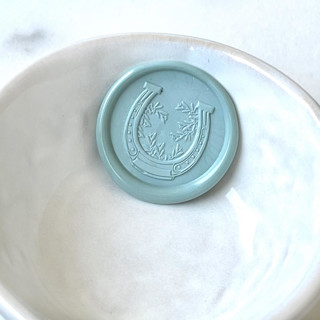 This is a multicolorassorted-colors wax seals by Abby Choi called horseshoe wax seal pack of 10, customizable in standard