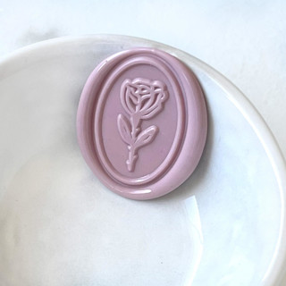 This is a multicolorassorted-colors wax seals by Abby Choi called oval rose wax seal pack of 10, customizable in standard