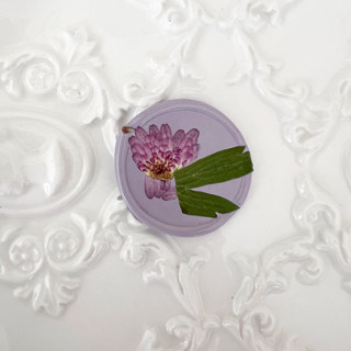 This is a purple wax seals by Caitlin Home called purple mums in lilac wax seals | pack of 10 in standard