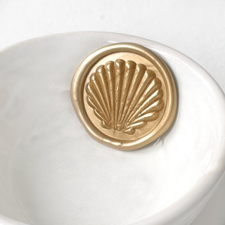 This is a multicolorassorted-colors wax seals by Abby Choi called seashell wax seal pack of 10, customizable color in standard