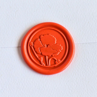 This is a multicolor wax seals by Inkspiringletters called california poppy- customizable color- set of 25 hand-crafted wax seals in standard