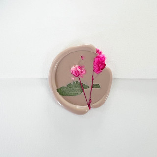 This is a pink wax seals by Caitlin Home called pink baby's breath wax seal in pink | pack of 10 in standard