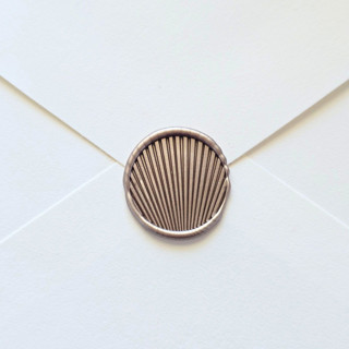 This is a multicolor wax seals by Inkspiringletters called mininalist seashell - hand-crafted wax seals- set of 25 in standard